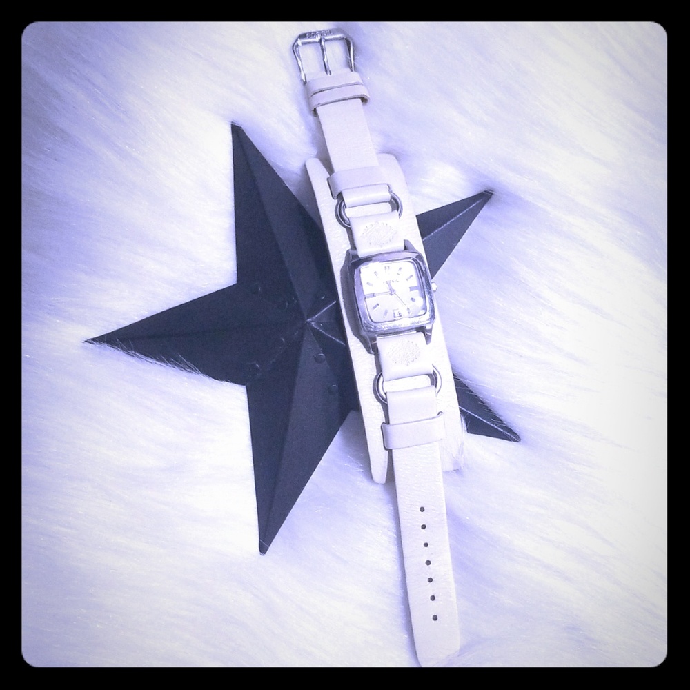 Vintage Fossil cuff style leather watch.